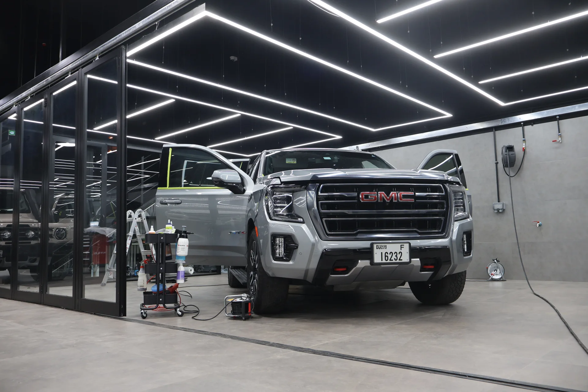 GMC in dedicated service bay with professional equipment